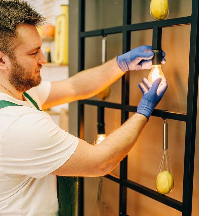 electrician-changes-the-light-bulb-handyman-resize.jpg